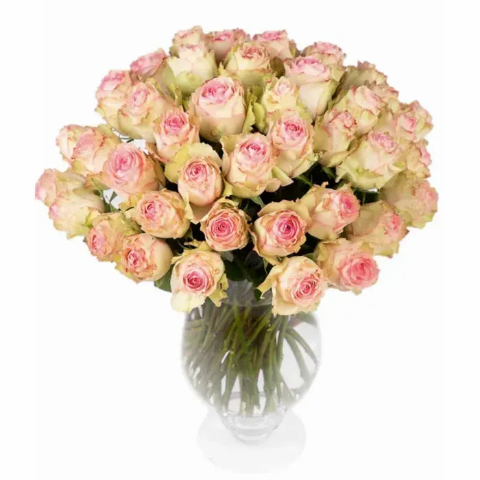 A beautiful arrangement of 50 vibrant yellow Esperanza roses in a sleek vase, showcasing the warm, golden blooms with a touch of elegance.