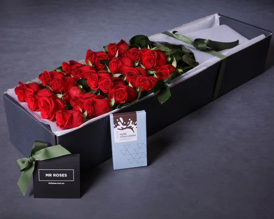A luxurious Long Stemmed Red Roses Box featuring elegant, tall red roses arranged beautifully in a modern box with a satin ribbon, symbolizing love and romance.