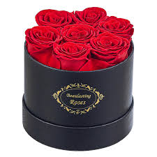 A beautiful Mini Red Roses Box with fresh, vibrant red roses arranged in a stylish, compact box, symbolizing love and passion.