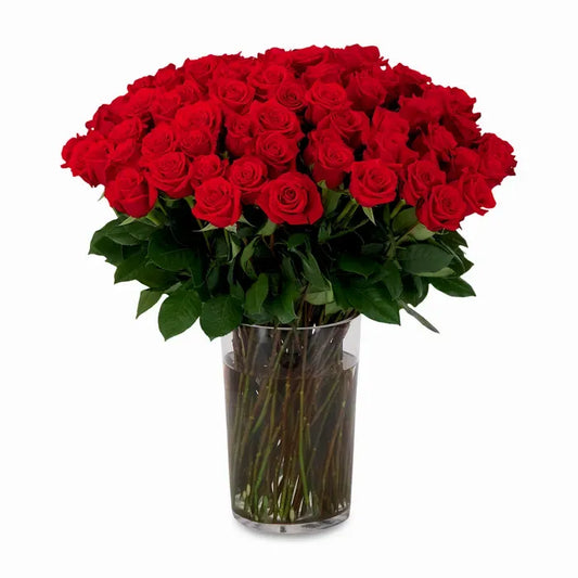 A classic bouquet of deep red roses, arranged elegantly to showcase their velvety petals and rich, passionate color.