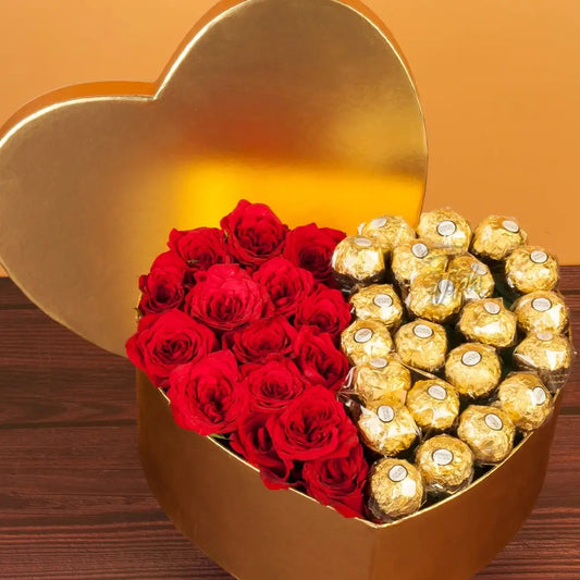 A Roses in Heart-Shaped Box arrangement featuring fresh roses beautifully arranged inside a heart-shaped box, symbolizing love and romance.